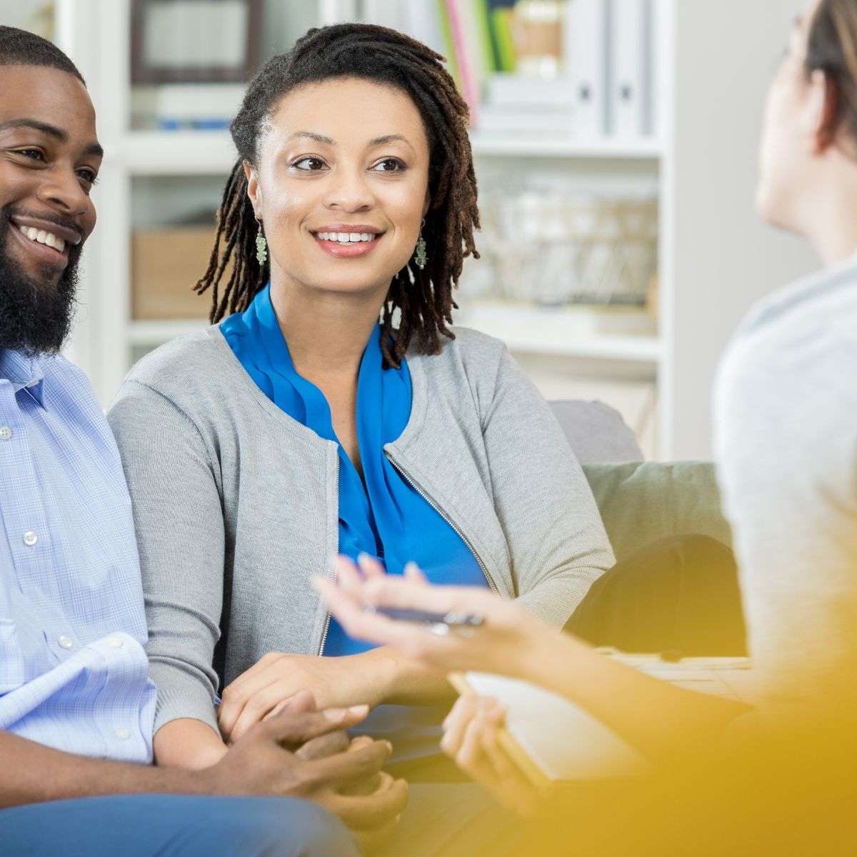Mindful Healing Couples Counseling and Marriage Therapy in New Jersey an african american couple talking to a caucasian counselor for marriage counseling