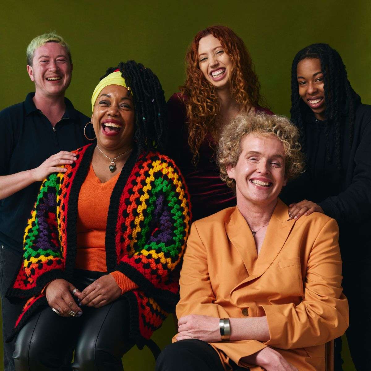 Mindful Healing Life Transitions Counseling in New Jersey group of five people of different ethnicities, backgrounds, and preferences embracing life