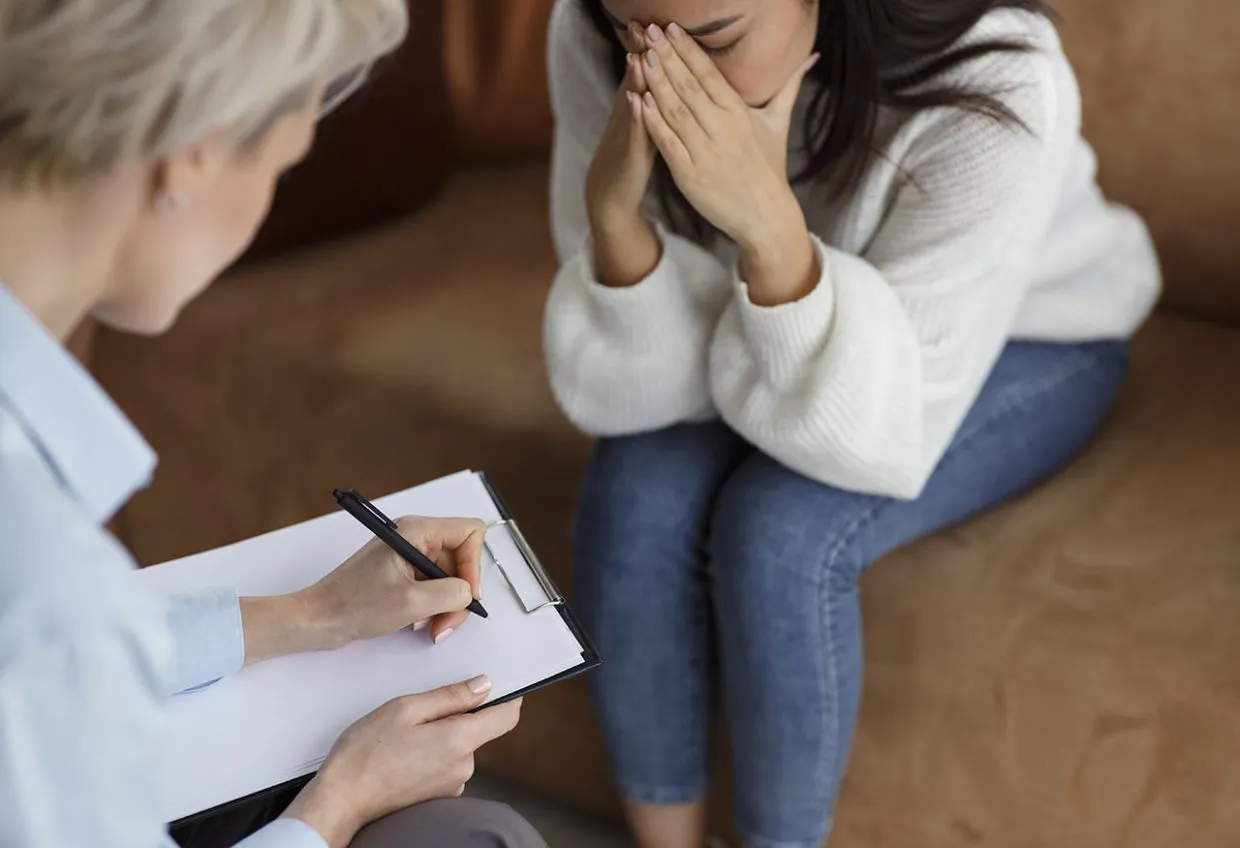 Therapist helping woman with panic disorder